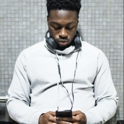 Man on mobile phone with headphones-portrait-1 Man on mobile phone with headphones-portrait-1